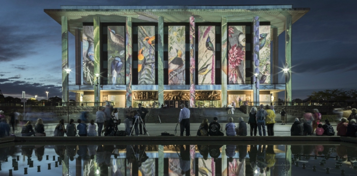 Ellis Rowan illustrations projected on the National Library of Australia building for Enlighten 2017.