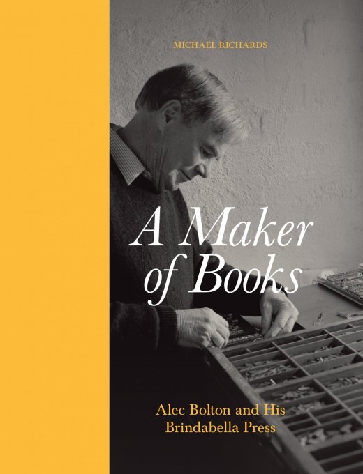 A yellow vertical rectangle on the left hand side of the image. On the right hand side is a  black and white photograph of a man sorting through printing press letters. Over the top of the image is text that reads 'Michael Richards. A Maker of Books. Alec Bolton and His Printing Press.'
