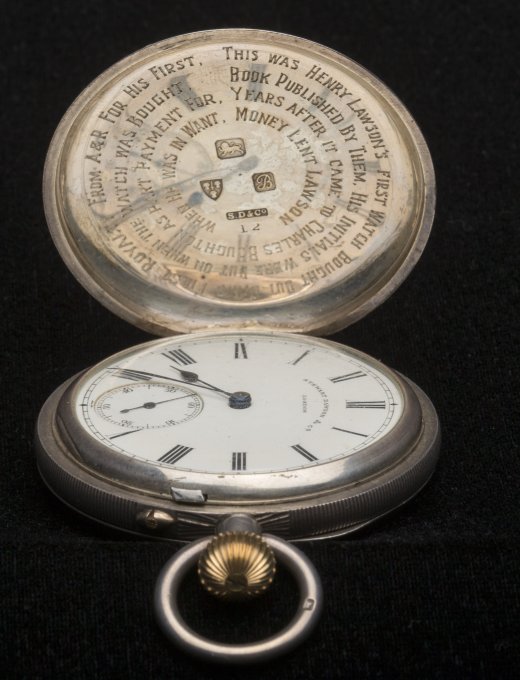 An old fashioned pocketwatch in an open position