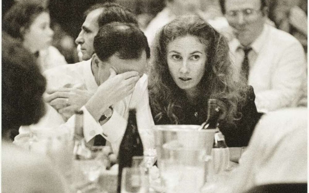 black and white photograph of couple seated at table