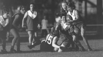 Kenins, Ian. (1997). Falcon's player, Cath Adams shoots out a handpass to teammate Bronwyn Hutchinson, Victoria, 1997, nla.obj-146570289.