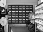 Black and white photograph of a storage cabinet used to hold filing cards