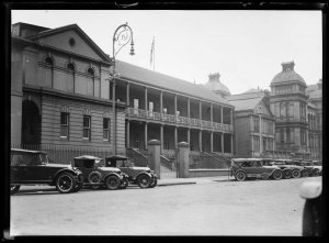 New South Wales State Parliament House with cars parked outside ca 1930