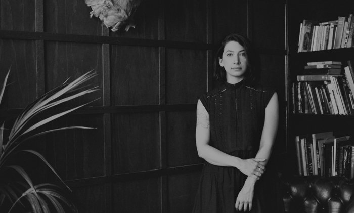 Black and white photo of writer Nadia Bailey.