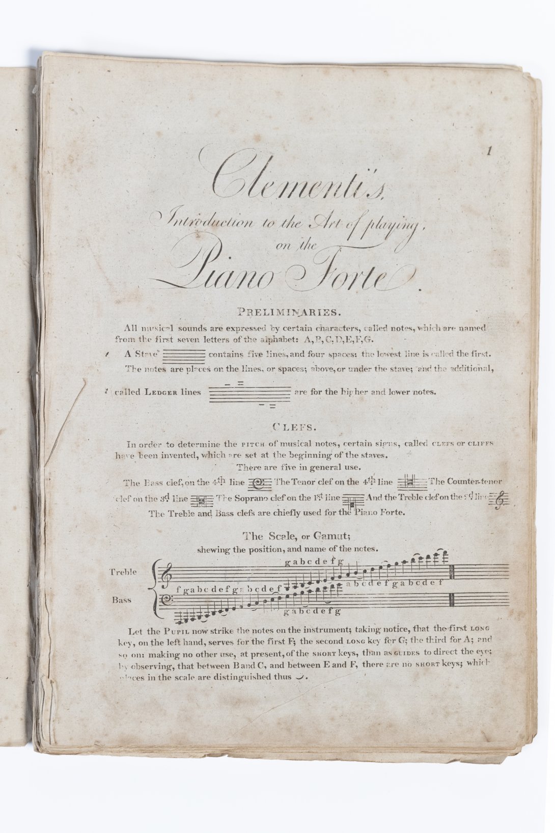 Faintly printed title page and beginning of a musical text book. 