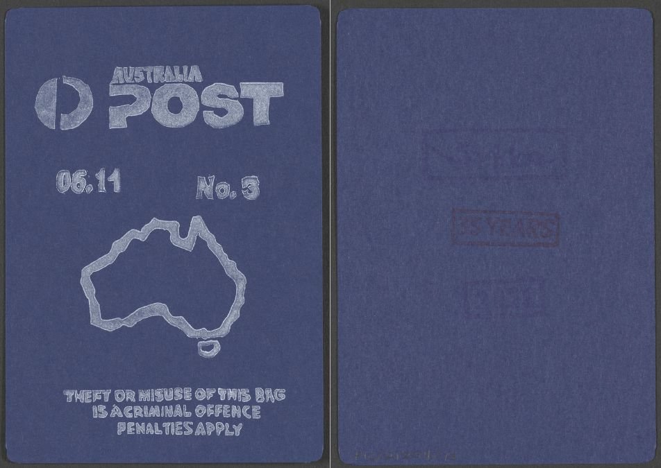 The front and back of a blue card. The front reads 'Australia Post 06.11 No.3 Theft or misuse of this bag is a criminal offence penalties apply'. The back reads 'Spike 35 years 2021'.