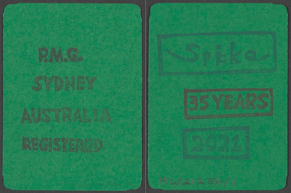 The front and back of a green card. The front reads 'P.M.G. Sydney Australia Registered'. The back reads 'Spike 35 Years 2021'.