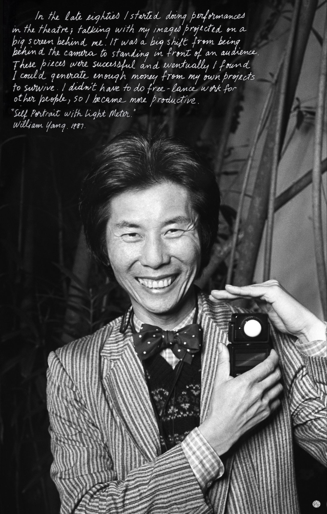 Self-portrait of William Yang smiling, with white text describing his life from the late 1980s in the top left corner